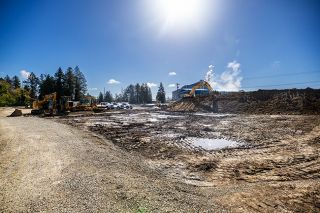 Rachel Thompson/News-Register##Workers and heavy equipment continue to clear land for the new Goodwill store that will be built in McMinnville this year. The site is on Highway 99W at the north end of town, across from the steel mill. Goodwill will move from its current location once the 10,000-square-foot building is finished.