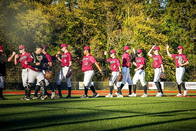 Photo Courtesy of Amy Webster##The Pirates share high fives after their 13-1 home victory over Gaston on Thursday, April 2. Three multi-hit performances helped the cause as Dayton secured its fourth double-digit win of the season.