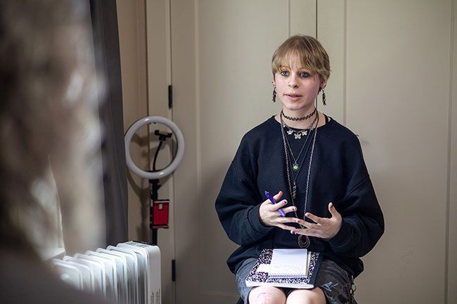 Rachel Thompson/News-Register##Jennifer Samp, a Yamhill Carlton High School student working on her senior project, interviews author CB Mason for an article in today&rsquo;s News-Register.