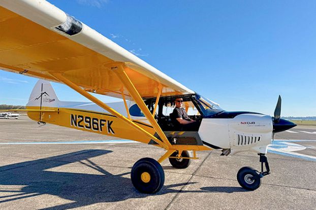 Image: Benjamin Powers##Leisure pilot Benjamin Powers sits in the cockpit of his lightweight CubCrafters bush plane. Powers was approved for a private airport permit on his property outside Carlton to operate the 1,000-pound craft capable of climbing 1,500 feet per minute.