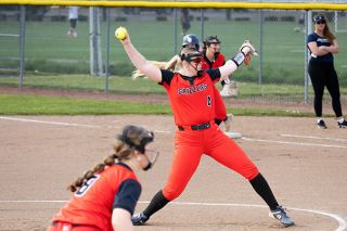 Nathan Ecker/News-Register##Rylan Carton follows through a pitch to Lake Oswego during the Grizzlies 6-2 win over the Lakers at the Baker Fields on Friday, April 10. Carton escaped major trouble and struck out two in the first (three for the game) to up season total to 17.