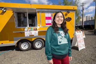 Rachel Thompson/News-Register##Diana Perez has moved her Flavor Kitchen food cart from Dayton to the Vineyards pod on Highway 99W next to Grocery Outlet in McMinnville. The cart offers Mexican favorites, including roasted corn, and smash burgers. Perez owned Mac Plaza in McMinnville before opening the cart.