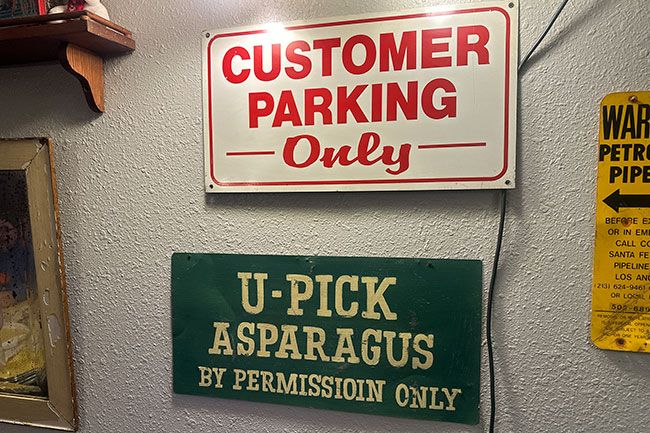 Kirby Neumann-Rea/News-Register##Wildwood Hotel dining area is a veritable museum of odd and obscure signs.