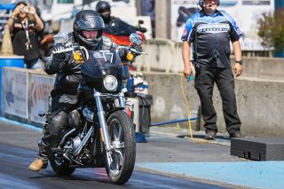 Nathan Ecker/News-Register##Charles Wallin of the BC Harley race team rips off the starting line in the right lane at Woodburn Dragstip on Saturday, April 18. Wallin was one of several BC Harley members who frequent the track and introduced Woodburn&rsquo;s new V-Twin Street Legal Class, which will allow everyday hog riders to test their mettle.
