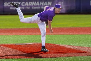 Nathan Ecker/News-Register file photo##Wildcat&rsquo;s sophomore Colton Ouellette follows through on a pitch during Linfield&rsquo;s matchup with Denison University on March 21 at Roy Helser Field. Ouellette was awarded the NWC Pitcher of the Week on April 20 for his seven shutout innings versus Whitman on April 18.
