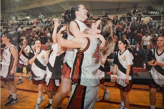 News-Register file photo## Maile Keliiheleua jumps into the arms of Robin Parker, celebrating Mac&rsquo;s 1999 Pac-8 conference title with a 56-47 win over Forest Grove in The Furnace.