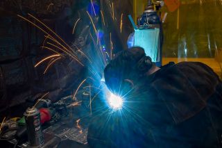 Rusty Rae/News-Register##Willamina student Stephen Sanchez-Haller welds the base of a BBQ pit as part of the SkillUSA welding contest on April 10. Haller along with Jace Warnicke and Joseph Godwin will represent Oregon at the National competition on in Atlanta, Georgia from June 1-5.