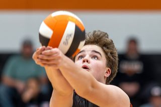 Rachel Thompson/News-Register##Yamhill Carlton&rsquo;s sophomore setter Harley Rohm digs deep to prep a teammate for a kill in the Tigers&rsquo; 3-0 victory over Valor Christian on Thursday, April 23, in the Tiger Dome. Rohm locked in for five aces and multiple assists as the Tigers reworked their offense.