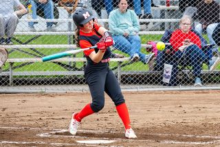 Nathan Ecker/News-Register file photo##Fiona Kreft swings through on pitch during Mac&rsquo;s home game versus Forest Grove on April 23. Kreft hit one of three homers in the team&rsquo;s 17-3 win over Newberg on May 1.