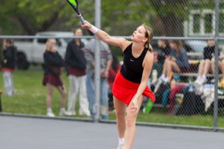 Rachel Thompson/News-Register file photo##Stephanie Fuchs follows through on a serve during the Grizzlies&rsquo; match versus Sandy on April 11. Fuchs is 10-1 overall on the season as Mac&rsquo;s No. 2 singles player. She lost her first match and has gone undefeated since.