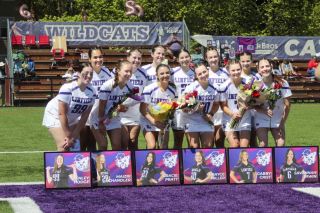 Photo courtesy of Amelia Solt##The Linfield lacrosse team poses for a team photo with their six seniors before their home game against Willamette University on Sunday, April 26. Top row, from left to right: Madison DeLaTrinidad, Heidi Schaefer, Evelyn Cross, Emma Gallegos, Apple Riso, and Alexa Brandt Bottom row,  from left to right: Tenley Hodge, Maizri Chandler, Gracie Pratt, Grayce Miller, Gabby Crist, Savannah Irwin.