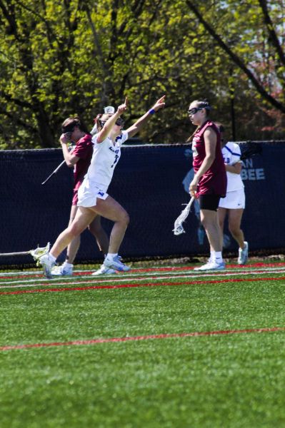 Photo courtesy of Amelia Solt## Senior Gabby Crist (7) celebrates after scoring and breaking the university&rsquo;s all-time goals scored record (195). Crist surpassed Rhea Hartlied (2000-03), who scored 192 goals and made 63 assists for 255 points.