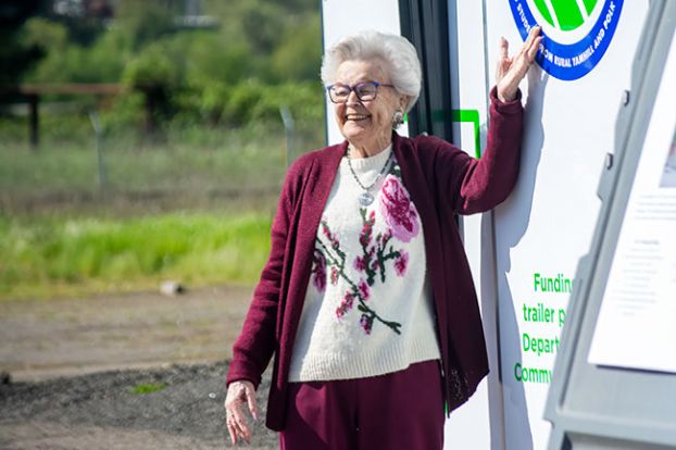 Emily Bonsant/News-Register##Former Gov. Barbara Roberts poses for a photo April 24 with an emblem of the planned Career Technical Education Center in Sheridan that will bear her name. Roberts, who served from 1991 to 1995 as Oregon&rsquo;s first woman governor, graduated from Sheridan High School in 1955.