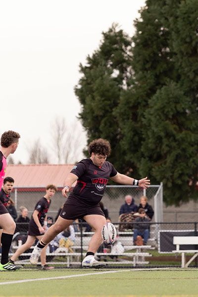 Elizabeth Morales-Marquez photo##Bobby Garibay kicks off for Western Oregon University at a home rugby tournament in Monmouth. He&rsquo;s one of 17 students who bought a new WOU Club Sport Player Pass.