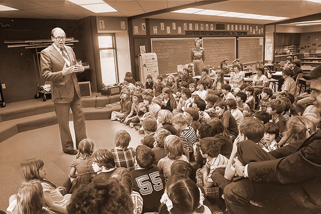 ##(May 3, 1956) Oregon Governor Bob Straub visited McMinnville Wednesday to view classroom scenes at Memorial and Columbus schools. With him was state Superintendent of Public Schools Verne Duncan. Here, Straub speaks to second and third graders at Memorial, where he viewed the four class &ldquo;pod&rdquo; room.