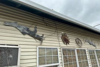 ##Leaping squid dogs at shuttered On The Way Cafe.