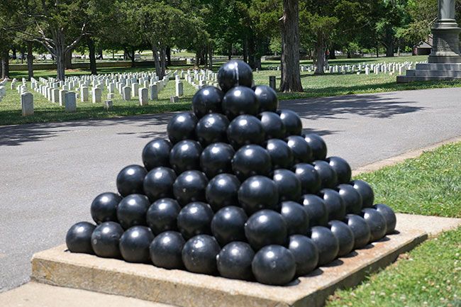 Rusty Rae/News-Register##A pyramid of canon balls stands guard over a cemetery at the Stones River National Battlefield.