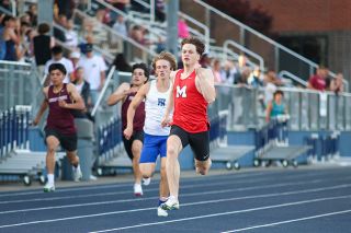 Nathan Ecker/News-Register## Kason Elkins outpaces Newberg&rsquo;s Joey Taylor and Forest Grove sprinters Alejandro Gutierrez Romero and Miguel Quijas in the 200-meter preliminaries at George Fox University on Wednesday. Elkins neared his PR in the event by less than a second, but more to his liking finally broke 11 seconds in the 100-meter. He looks to qualify for state in both events on Friday.