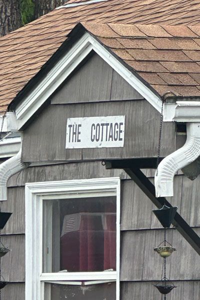 Kirby Neumann-Rea/News-Register##Gently-generic sign on a small home near Taylor Park.