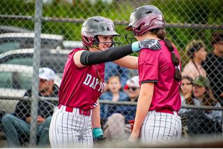 Photo courtesy of Amy Webster##Hayden Bell (left) and Jayden Mayhew (right) share words about what they&rsquo;ve seen from Banks pitching. Bell saw a beach ball, going 2-for-3 with two RBIs.