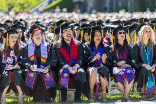 Rachel Thompson/News-Register##Graduates chant &ldquo;Si, se puede&rdquo; &mdash; &ldquo;Yes, we can&rdquo; &mdash; during Linfield University&rsquo;s commencement ceremony Sunday in McMinnville after speaker Gregory Nava encouraged students to &ldquo;not only build a career, but build a better world.&rdquo;