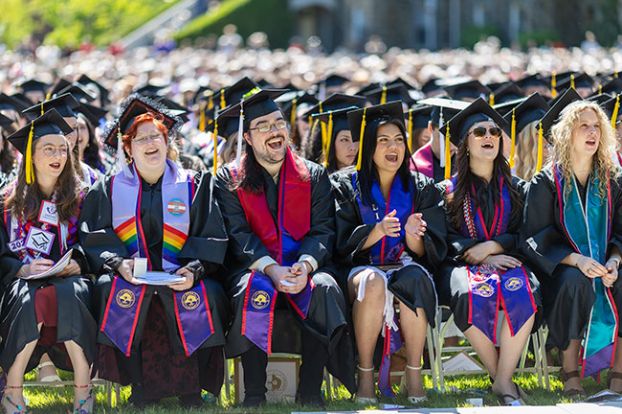 Rachel Thompson/News-Register##Graduates chant &ldquo;Si, se puede&rdquo; &mdash; &ldquo;Yes, we can&rdquo; &mdash; during Linfield University&rsquo;s commencement ceremony Sunday in McMinnville after speaker Gregory Nava encouraged students to &ldquo;not only build a career, but build a better world.&rdquo;