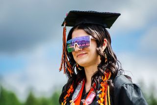 Rachel Thompson/News-Register##Willamina High School graduate Kelsea Gray looks out to the sea of family members and supporters on Saturday, May 30. First-year Principal Jeremy Hurl said he was &ldquo;overwhelmed&rdquo; by community support for the graduates. Families began gathering two hours before commencement was scheduled to begin.