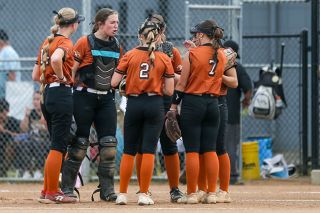 Photos courtesy of Gloria Coleman, The News-Review##Yamhill Carlton senior catcher Addison Tuning addresses her infield around the pitcher&rsquo;s circle during the Tigers&rsquo; semifinal contest versus South Umpqua on Tuesday, June 2. Tuning was one of seven seniors playing their final game in Tiger black and orange. Of the group, Head Coach John Kuehnel praised his upperclassmen for their fight during the season to become the winningest YC team in five years.