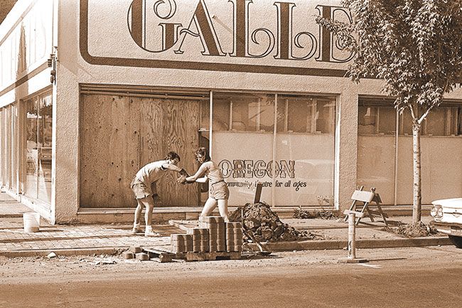 ##(June 1, 1981) A two-person construction crew added an artistic touch to the exterior of Gallery Theatre last week with the installation of sidewalk bricks. Rather than cement, the bricks are carefully placed together, then sand was spread over them and vibrated down between the narrow cracks. It provides a smoother surface, the crew explained.