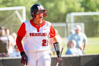 Rusty Rae/News-Register file photo## Juliet Pesina-Wade lets out a battle cry during McMinnville&rsquo;s 7-4 road playoff victory against Forest Grove on Wednesday, May 27. The junior was the team&rsquo;s most powerful bat in her first season back after moving across the country.