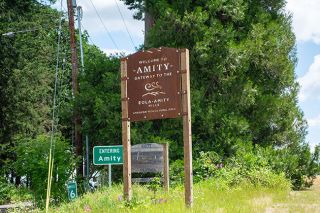 Emily Bonsant/News-Register##A trio of signs announce the western entrance to Amity near where Bellevue Hopewell Highway becomes Fifth Street.