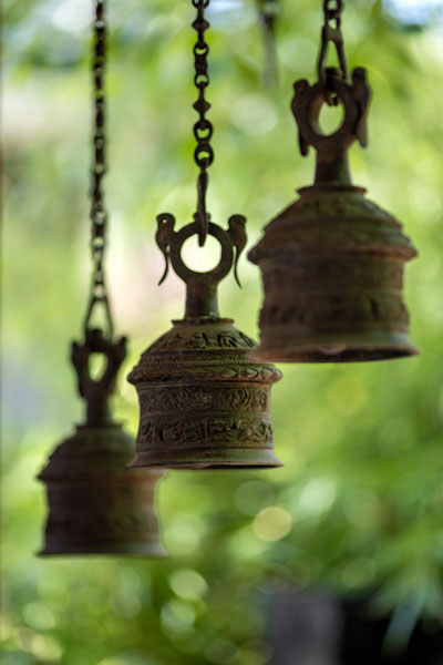 Rachel Thompson/News-Register##A trio of brass bells help to carry out the Asian theme.