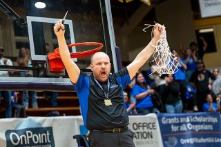 Rusty Rae/News-Register file photo##Jed McMullen throws up arms equipped with scissors and the net from Amity&rsquo;s championship victory over No. 1 Vale at Marshfield High School in Coos Bay on March 7. The celebration marked McMullen&rsquo;s second-straight 3A State title.