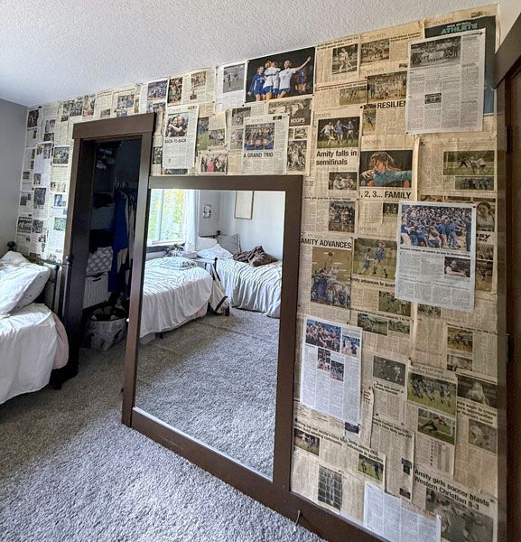 Submitted by Adie and Eliza Nisly##News-Register coverage of the athletic achievements of the Nisly twins, Eliza and Adie, decorate a wall in their home in Amity. The star duo helped lead the Amity High Warriors to state titles in basketball and soccer, in addition to highlights in track and field, during their just-concluded four year tour.