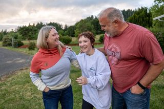 Rachel Thompson/News-Register##Ripley Anderson has returned home to Willamina with her parents (left) Mariza Anderson and (right) Tim France to continue recovering from a traumatic brain injury suffered late last year in an automobile accident.
