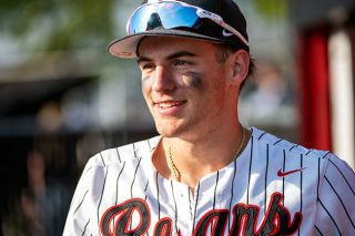 Rusty Rae/News-Register file photo##Cameron Hyder smiles in the sunshine during a Grizzlies&rsquo; home game this past spring. The four-year varsity baseball standout made it a point of emphasis during his final season to always keep the energy high and attitude&rsquo;s light on game days.