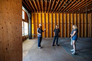 Rachel Thompson/News-Register##Stefon Orloff, left, gives a tour of the Heider Building in downtown Sheridan to Sheridan Revitalization Movement members Ashton Sander and Tkeisha Wydro. Orloff is seeking businesses to lease spaces in building, which he recently bought with his wife, Michele.