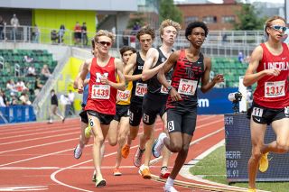 Nathan Ecker/News-Register##McMinnville&rsquo;s Isaiah Carpenter fights past a crowded pack of runners during the class 6A boys&rsquo; 1500-meter championship at Hayward Field on Saturday, May 30. Carpenter placed seventh with a time of 3:56.36. It was his first time finishing under the four-minute mark. At the Nike Outdoor Nationals, Carpenter opened with a slower pace but sprang ahead in the second half to put several strides between himself and the middle of the pack.