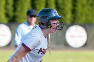 Rusty Rae/News-Register file photo##Dayton&rsquo;s Gabby Chupp reaches third base and yells toward her dugout in the Pirates contest versus YC on April 30.