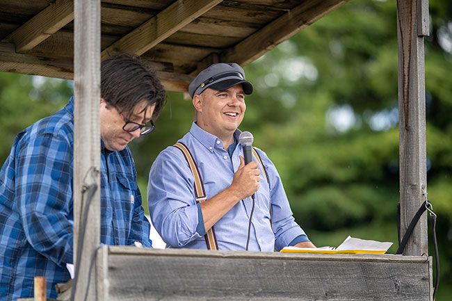 Rachel Thompson/News-Register##Dan Gibson, left, and John Olson provided play-by-play commentary, mixing banter with historical anecdotes and explanations of the game&rsquo;s rules.