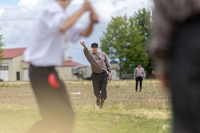 Rachel Thompson/News-Register##Hurler Jack &ldquo;Maverick&rdquo; Maxwell of the McMinnville Gristmillers delivers a pitch to a St. Joseph Boilermaker. The game, played without gloves and according to 1866 rules, this year was part of the American Past Time slate of activities and demonstrations on the museum grounds.