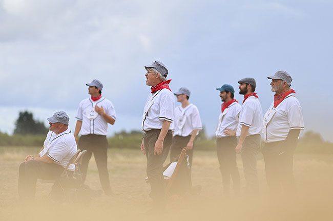 Rachel Thompson/News-Register##The St. Joseph Boilermakers follow the action from the sidelines. Opponents traded good-natured jabs and engaged in friendly heckling, known as &ldquo;cranking,&rdquo; throughout the game.
