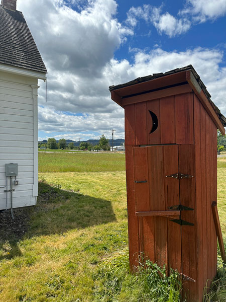 Kirby Neumann-Rea/News-Register##The Dutch half-door distinguishes the outhouse at the history museum.