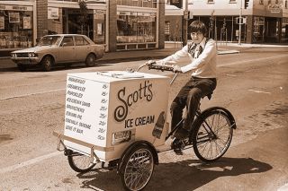##(June 30, 1976) Scott Magers, McMinnville, has his own touring ice cream wagon, patterned after a similar vehicle in Victoria, B.C. He sells about 50 bars a day.
