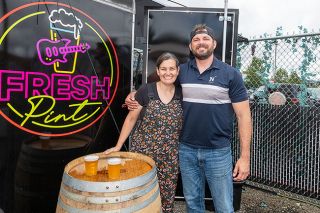 Rusty Rae/News-Register##Nick and Natalie Manzke have opened their Fresh Pint food and beverage truck in The Vineyard pod near Grocery Outlet. The truck serves beer, wine, cocktails and &ldquo;Devil Dogs,&rdquo; a hot dog named in honor of Nick&rsquo;s status as a retired Marine. Also a musician, Nick plans to host karaoke there on Thursday evenings and live music on other occasions.
