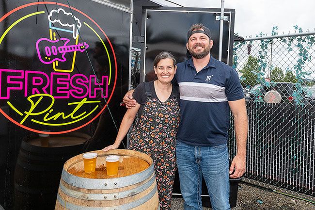 Rusty Rae/News-Register##Nick and Natalie Manzke have opened their Fresh Pint food and beverage truck in The Vineyard pod near Grocery Outlet. The truck serves beer, wine, cocktails and &ldquo;Devil Dogs,&rdquo; a hot dog named in honor of Nick&rsquo;s status as a retired Marine. Also a musician, Nick plans to host karaoke there on Thursday evenings and live music on other occasions.