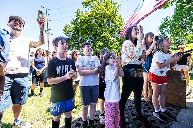 Rachel Thompson/News-Register##Spectators cheer on arm wrestlers Beridze and Mode, with children leading chants of &ldquo;Beast MODE! Beast MODE!&rdquo; throughout the match.