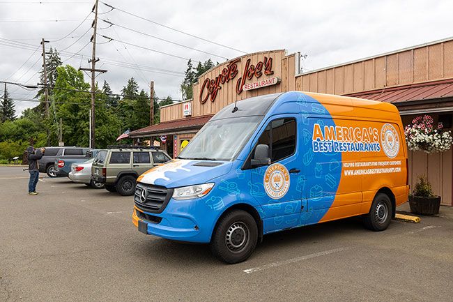 Rachel Thompson/News-Register##A production van sits outside Coyote Joe&rsquo;s as filming gets underway.