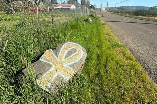 Kirby Neumann-Rea/News-Register##Painted boulders grace the verge on Stillers Mill Road outside Yamhill.