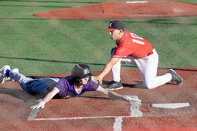 Nathan Ecker/News-Register##Caleb Gray, an incoming Grizzly sophomore, puts the tag on a Columbia River baserunner attempting to cross home plate on a passed ball. Gray pitched 1 1/3 innings in relief of Sam Steele versus Columbia River as Mac tried to unsuccessfully pull out a victory from their third game of the tournament. Nathan Ecker/News-Register##Caleb Gray, an incoming Grizzly sophomore, puts the tag on a Columbia River baserunner attempting to cross home plate on a passed ball. Gray pitched 1 1/3 innings in relief of Sam Steele versus Columbia River as Mac tried to unsuccessfully pull out a victory from their third game of the tournament.